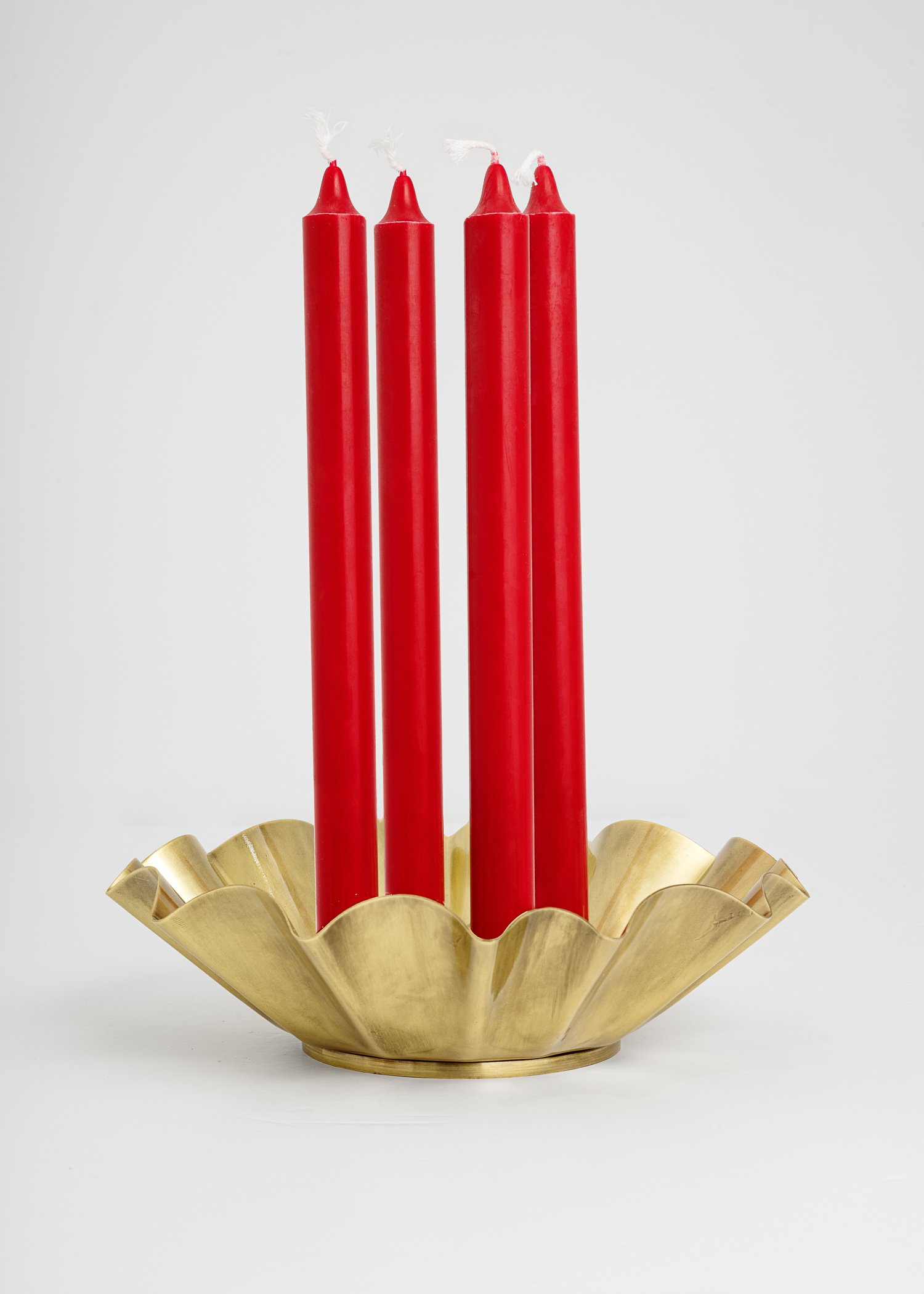 Brass-coloured candle holder