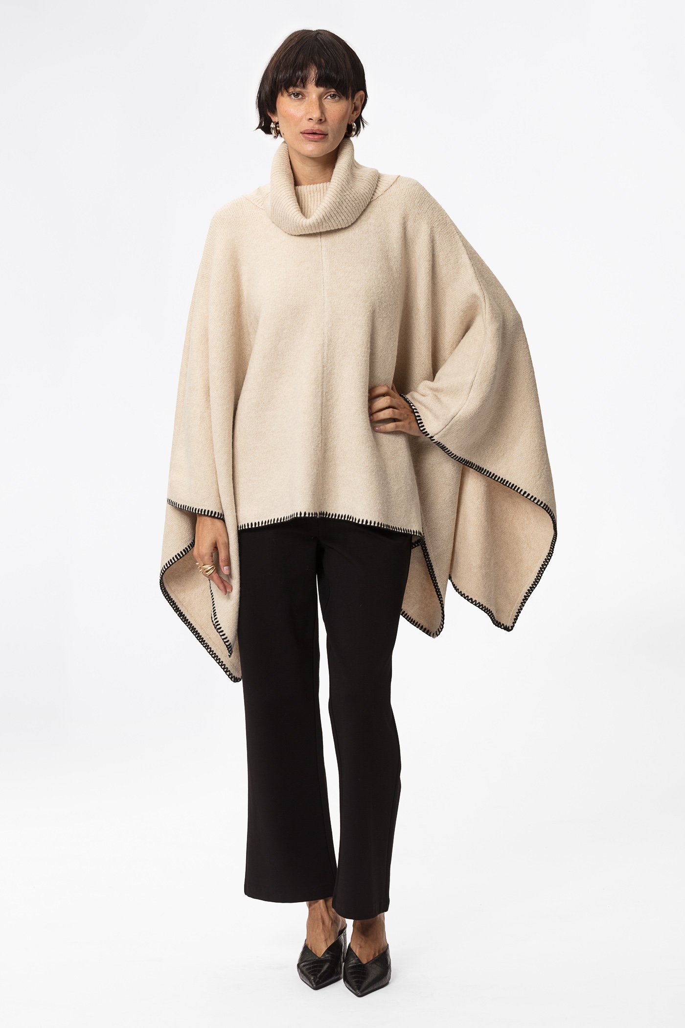 Beige poncho thumbnail 1