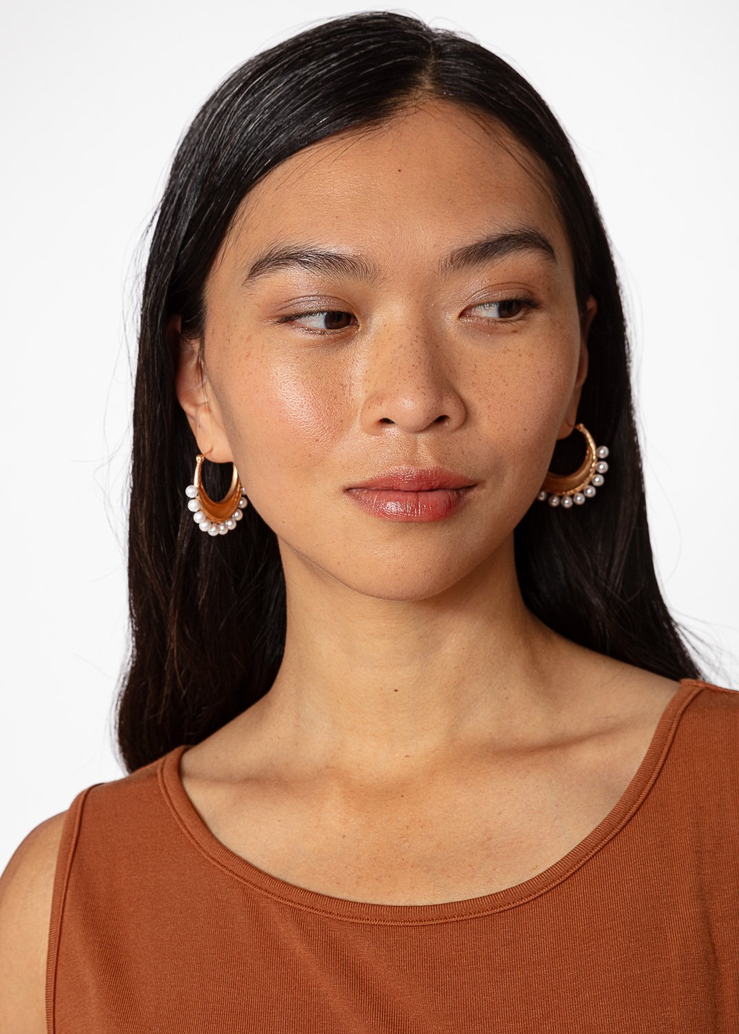 Shiny gold coloured earrings