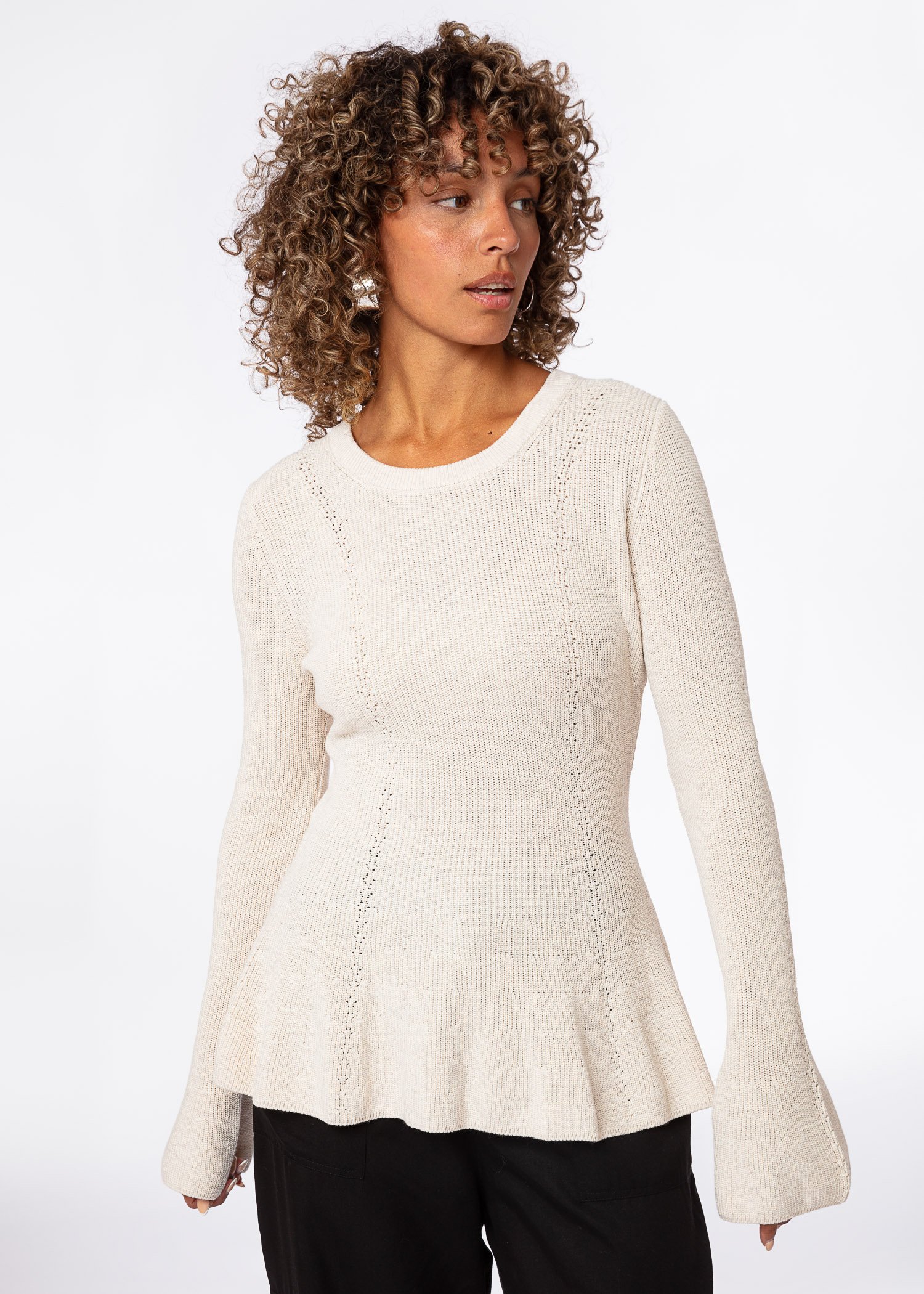 Knitted peplum sweater